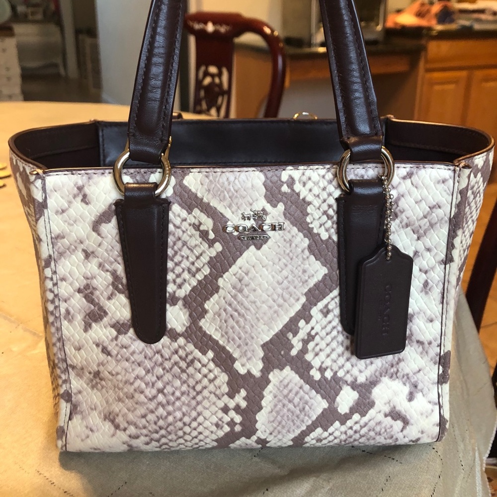 Authentic COACH handbag. Purple leopard print